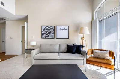 a living room with a couch and a chair at Century City 2BR w WD BBQ nr Mall LAX-334 in Los Angeles