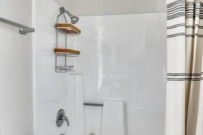 a bathroom with a shower curtain and a sink at N Hollywood 2BR w Gym Pool nr TJ Shops LAX-591 in Los Angeles