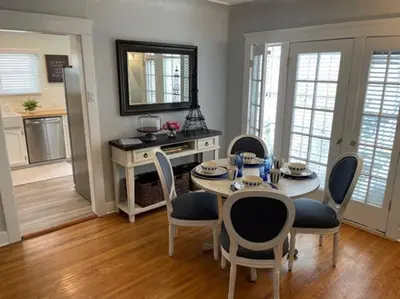 a dining room with a table and chairs at The Heart of Belmont Shore in Long Beach