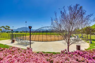 a basketball court in a park with flowers at Family-Friendly Camarillo Home with Access to Pools! in Camarillo