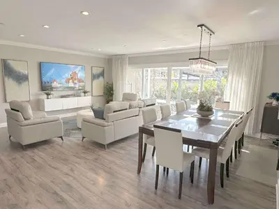 a living room with a dining table and chairs at Disneyland Paradise 6 BedRoom 4 Bathroom Pool Spa Games in Anaheim