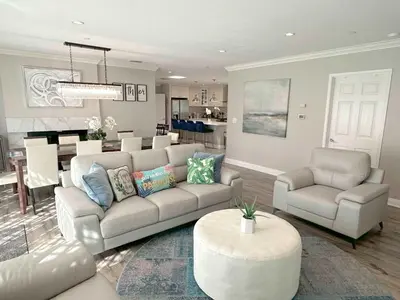 a living room with a couch and chairs and a table at Disneyland Paradise 6 BedRoom 4 Bathroom Pool Spa Games in Anaheim
