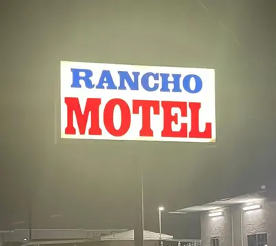a sign that says rambalo motel in front of a building at Rancho Motel - Ontario Airport in Ontario