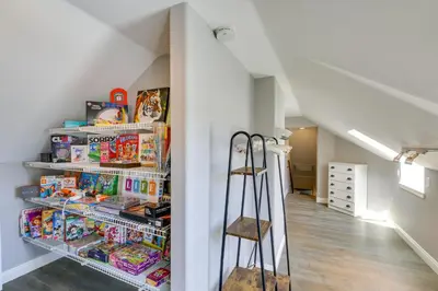 a room with an open pantry filled with food at Stunning Home in Orange County with Stables! in Orange