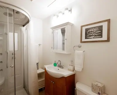 a white bathroom with a sink and a shower at 30 PCT OFF! Malibu Peaceful Getaway, Beach, Ocean in Malibu