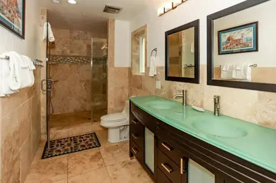 a bathroom with a sink and a toilet and a shower at Circle Views by Big Bear Vacations Walk To Lake Boulder Bay Chalet in Big Bear Lake