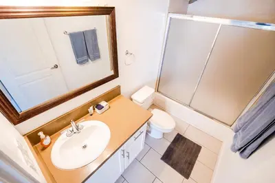 a bathroom with a sink and a shower and a toilet at Large Condo Sleeps 10 near Downtown Los Angeles in Los Angeles